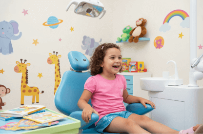 Pediatric dentist with a young patient